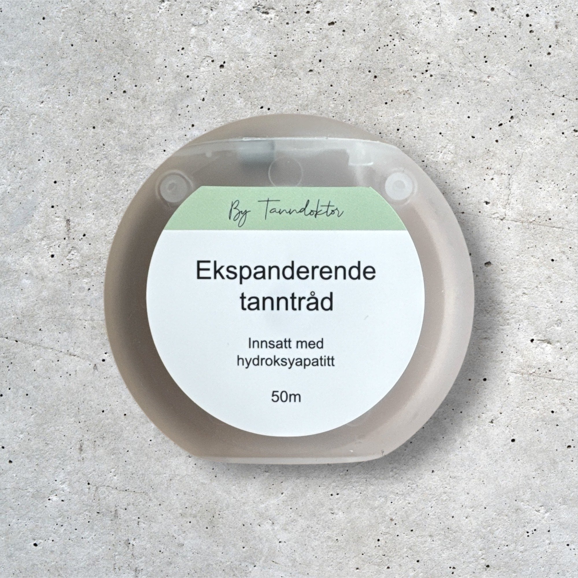 Ultramyk tanntråd med hydroksyapatitt