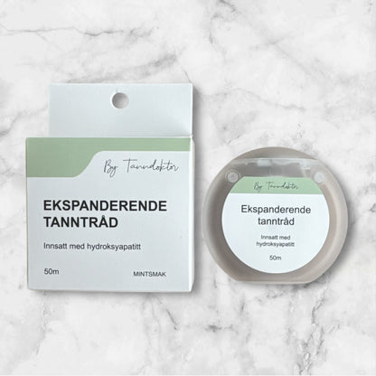 Ultramyk tanntråd med hydroksyapatitt